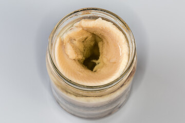 Pickled herring fillets in jar on gray background, top view - 787046113
