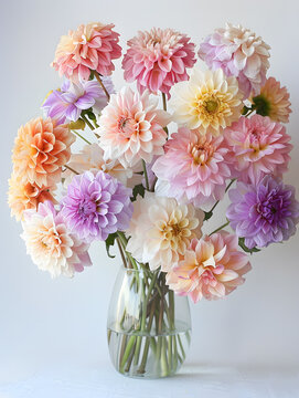 A vase overflowing with a diverse array of colorful flowers