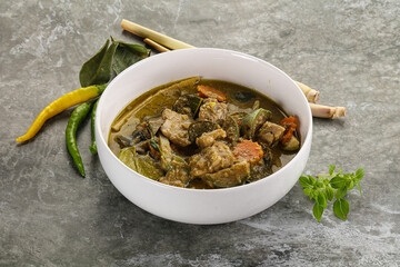 Thai green curry soup with basil