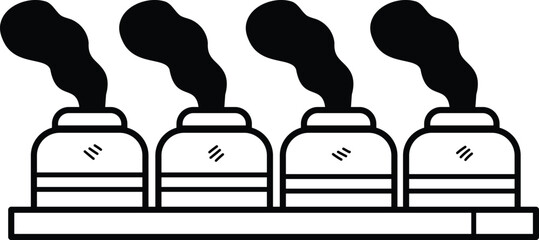 A large factory with smoke coming out of the top