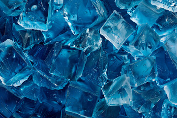 Blue ice cubes, close up with a shallow depth of field.