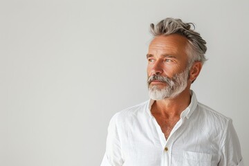 Obraz premium Portrait of Handsome Mature 50s 60s 70s Middle Aged Healthy Man Isolated on White or Grey Background. Anti-aging Skin Care Beauty, Cosmetics Concept. Natural Beauty Product