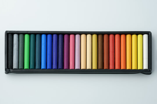 Set of colorful oil pastels on white background.Oil pastels color in box isolated on white background. Crayons