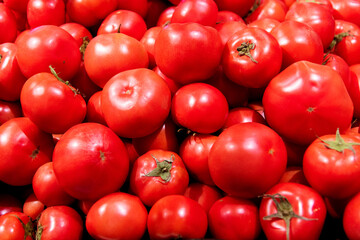 Pile of red tomatoes in market