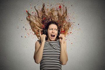 Screaming woman with headset on gray background  - 787063182