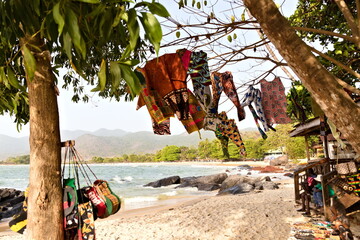 African beach with clothes on the trees