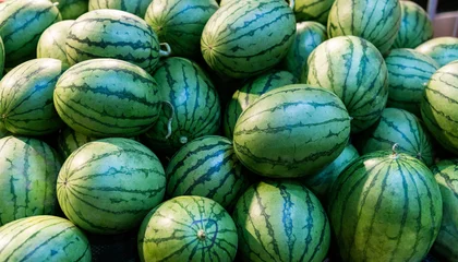 Plexiglas foto achterwand Pile of fresh watermelons in market © xy