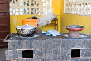 Cocina tradicional fuego de leña África - obrazy, fototapety, plakaty