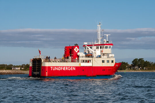 Ferry Tunofaergen with passengers approaching Tuno island harbor, Midtjylland, Denmark