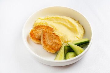 mashed potato with cutlets and cucumber