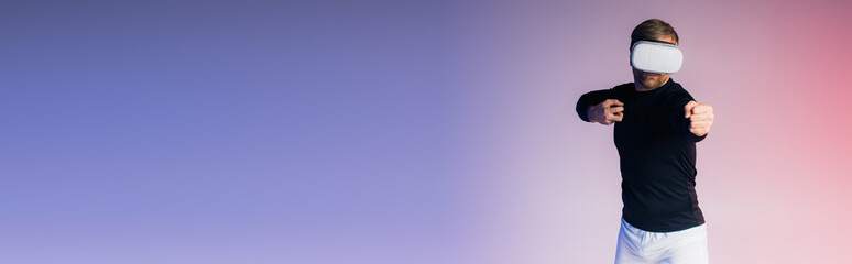 A man wearing a vr immersed in a virtual reality experience in a studio setting.