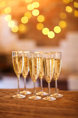 Champagne glasses on golden background