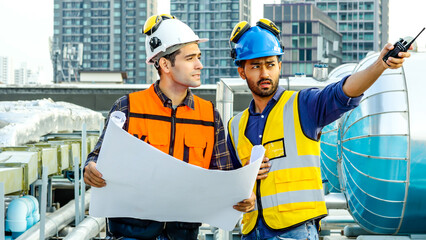 Contractor, Two civil engineers checking information from blueprint with teamwork, project manager planning and collaboration, outdoor construction worker and floor plan for urban development in city - obrazy, fototapety, plakaty