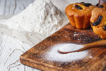 muffins baked with the addition of ammonium carbonate on a wooden rustic background