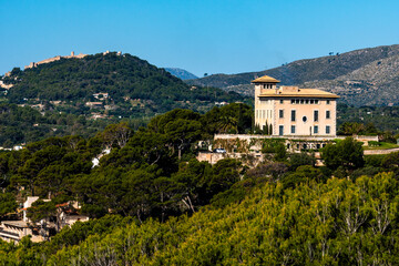 Fototapeta na wymiar mansion on a hill at Mallorca with a clear blue sky