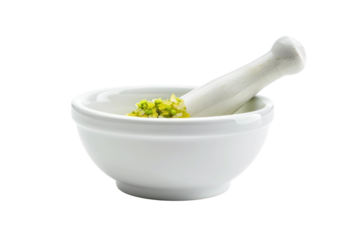 White porcelain mortar and pestle with yellow and green
isolated on white background