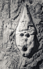 Crude Faces Carved Into The Limestone Walls Of The Hellfire Cave Tunnels
