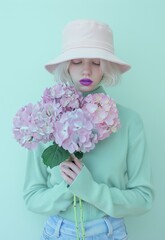 Woman Wearing Pink Hat Holding Bouquet of Flowers