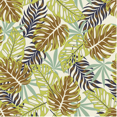 Abstract seamless tropical pattern with bright plants and leaves on a pastel background. Seamless pattern with colorful leaves and plants. Modern abstract design for fabric, paper, interior decor.