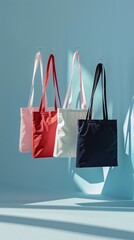 Array of promotional totes hanging elegantly, each showcasing different digital mockups, perfect for a fashion accessory showcase