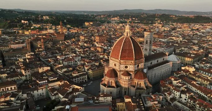Florence Italy Duomo and downtown skyline aerial drone sunrise morning and sunset video. 
