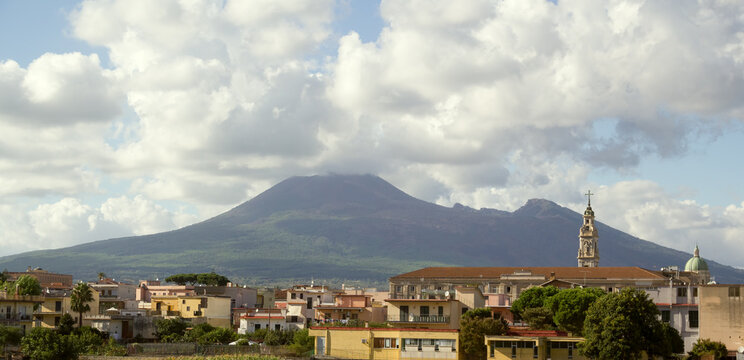 View of part of the city of Pompei, including Pontifical Shrine of the Blessed Virgin of the Rosary of Pompei and Pontificio Istituto Bartolo Longo, with the Mount Vesuvius in the background