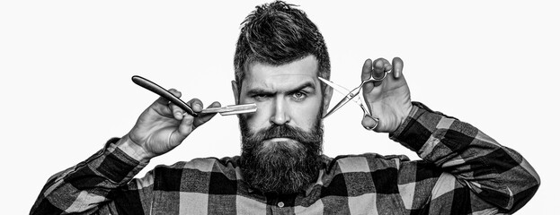 Barber with straight razor and scissor. Brutal man holding professional tools. Mens haircut. Vintage barbershop, shaving. Man hairdresser in a plaid shirt holding a sharp scissors. Black and white - obrazy, fototapety, plakaty