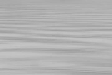 Intentional camera movement (ICM) image of sea ice covered with snow in winter created by motion...