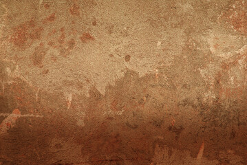 Sienna color grunge clay wall