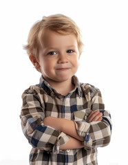 Smiling boy in plaid shirt posing