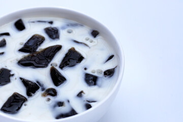 Grass jelly in milk, herbal dessert. Mesona chinensis