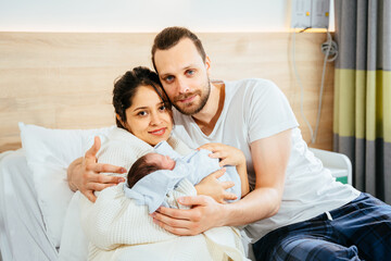 parents with newborn baby, Closeup portrait of asian young couple father mother holding new born...