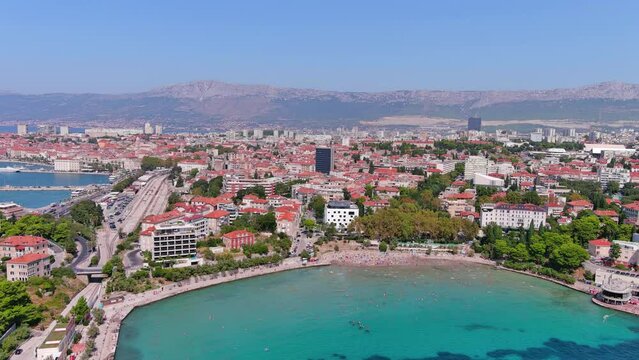 Split, Croatia: Aerial view of famous Mediterranean city by Adriatic Sea, Bacvice Beach (Plaža Bačvice), summer day with clear blue sky - landscape panorama of Europe from above

