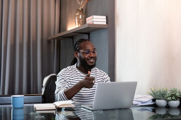 African american business afro man live online meeting on computer home. Freelance online sme...