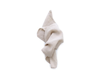 Flat lay with beige linen kitchen napkin isolated on white background. Folded cloth for mockup