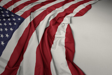waving national flag of united states of america on a gray background.