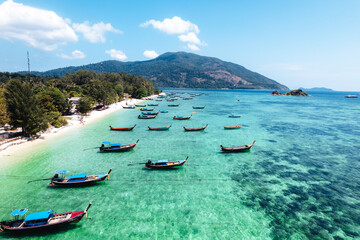 Aerial view of longtail boat and beach at Koh Lipe.