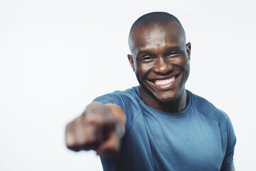 Happy, portrait and black man pointing to you with fitness for sign up, join or opportunity on a...