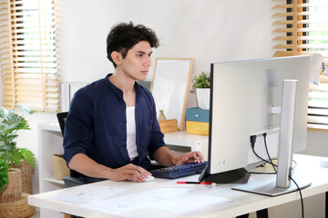 Man working with computer at home office, Working at home, Online learning education - 787166971