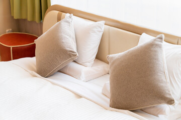 ホテルのベッドの写真。宿泊のイメージ。