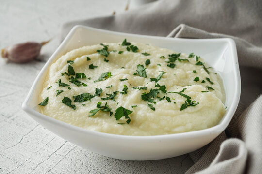 delicious mashed cauliflower on a white background