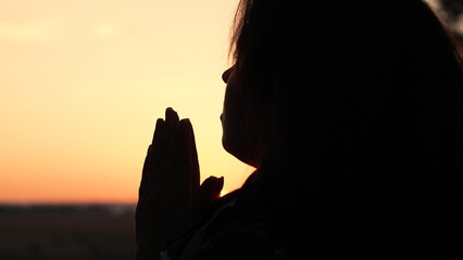 girl woman praying at sunset, hand sunset faith pain, asking heaven for help, girl sunset...