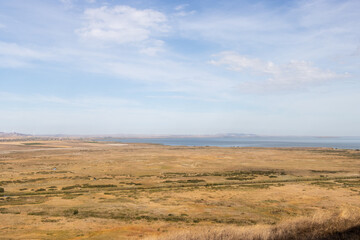 Fototapeta premium Landscape photo from the top of The Enisala Medieval Fortress near Jurilovca in Tulcea, Romania.
