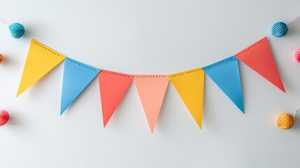 Obraz premium Photo of a colorful bunting banner on a white background, with space for text. Happy birthday
