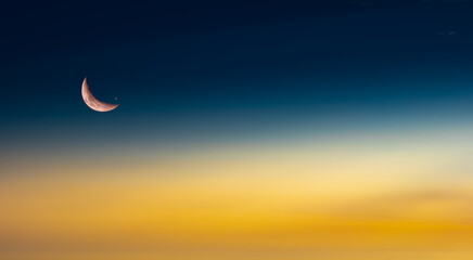 Background of half moon and starry sky and sunset Greeting card for the holy month of Ramadan of...