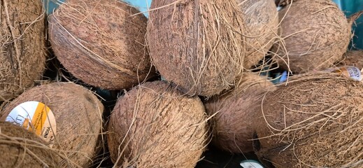 Group of Coconuts in Market