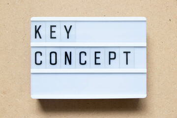 Lightbox with word key concept on wood background