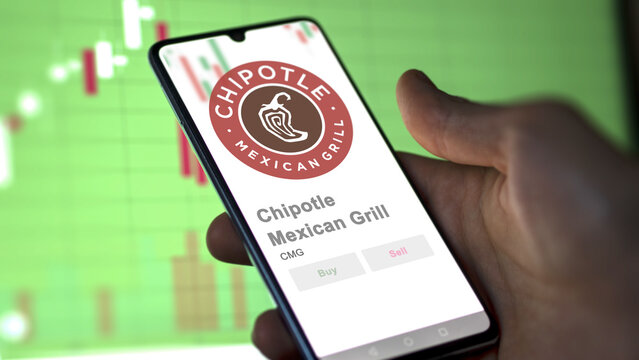 April 09th 2024 , Newport Beach, California. Close up on logo of Chipotle Mexican Grill on the screen of an exchange. Chipotle Mexican Grill price stocks, $CMG on a device.