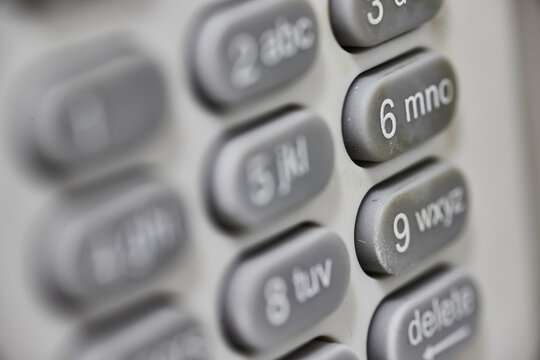 Close-Up Telephone Keypad Focus on 5, 6, 9 - Angled Perspective