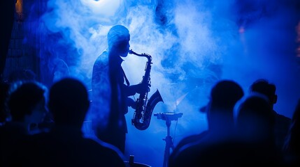 Saxophonist Silhouetted in Smoky Blue Ambiance Captivates Attentive Jazz Club Audience